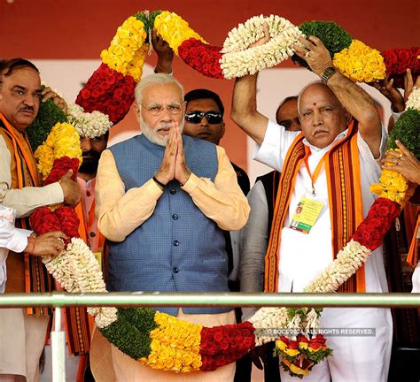 Prime Minister Narendra Modi addresses during an election campaign rally in Bengaluru - Photogallery