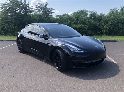 Black Model 3 with black wheels and black tint 30% – Tesla Model 3 Wiki