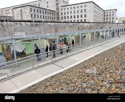 The outdoor exhibits at the Topography of Terror museum. A stretch of the Berlin Wall runs above ...