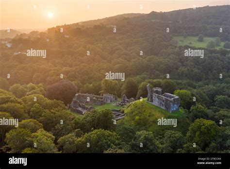 Aerial view of Okehampton Castle ruins at sunrise, Okehampton, Devon, England. Autumn (September ...