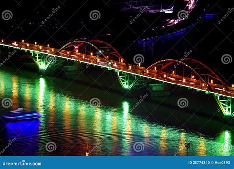 Arch bridge at night stock photo. Image of scene, urban - 25774340