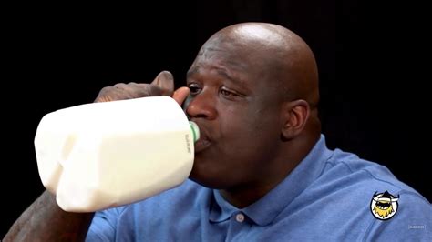 Shaq holding the same gallon of milk but also drinking it cuz he dyin of spicy : r/ShaqHoldingThings