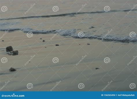 The Small Waves on the Beach Stock Photo - Image of sand, beach: 156265494