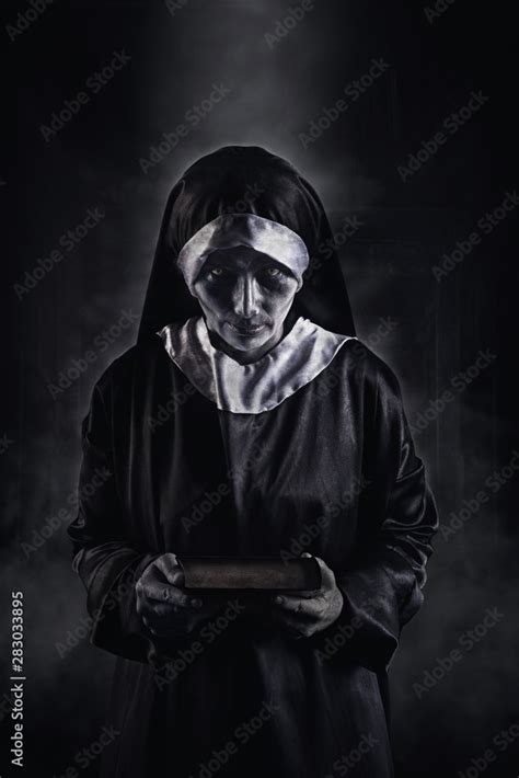 Horror Scene of a Possessed nun Woman ghost halloween in dark room Stock Photo | Adobe Stock