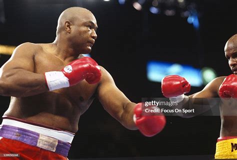 George Foreman, left, fights Michael Moorer, right, in a heavyweight... News Photo - Getty Images