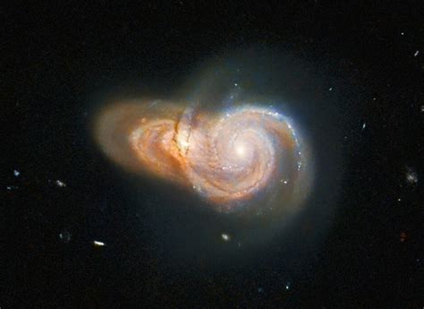 Hubble Space Telescope Captures Dazzling Image of Two Overlapping ...