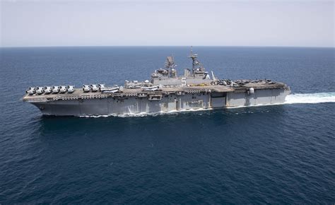 The amphibious assault ship USS Bataan (LHD 5) transits the Arabian Gulf. April 5, 2020 U.S ...