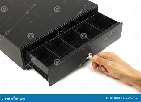 Opened Empty Black Cash Drawer and Hand with Key in Lock, White Background, Concept of ...