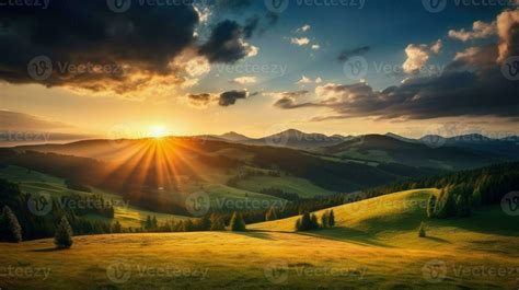 mountain countryside landscape at sunset. dramatic sky over a distant valley. green fields and ...