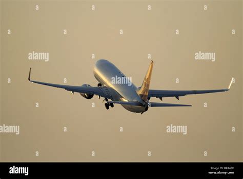 Plane Taking Off Sunset High Resolution Stock Photography and Images ...