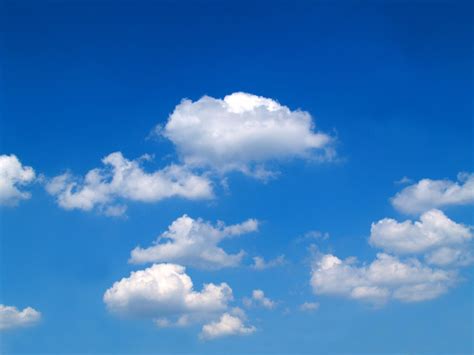 Free White clouds in blue sky Stock Photo - FreeImages.com