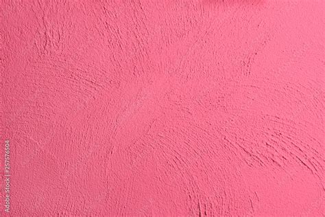 Pattern on rough render cement wall paint with pink color, grunge stucco texture wall, pink ...