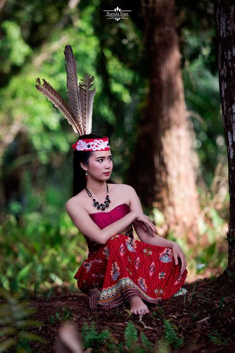 Dayak Girl Wearing Traditional Costume | Modern costumes, Traditional ...