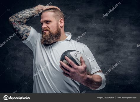 Bearded rugby player with tattoos Stock Photo by ©fxquadro 133942468