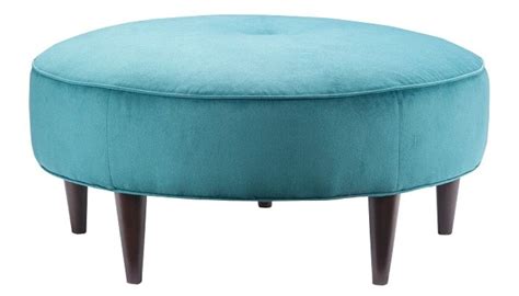 Beautiful Blue Round Ottoman. This would sell very easily. The batting and foam may be a ...