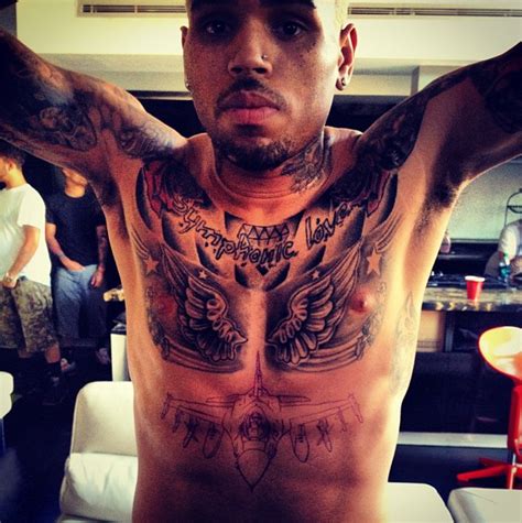 Rhymes With Snitch | Celebrity and Entertainment News | : Chris Brown Gets a New Tattoo