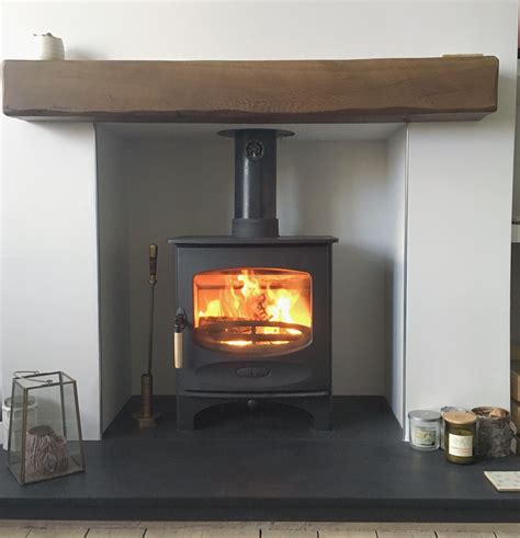 Charnwood log burner with oak beam, hygge style living room for cozy ...