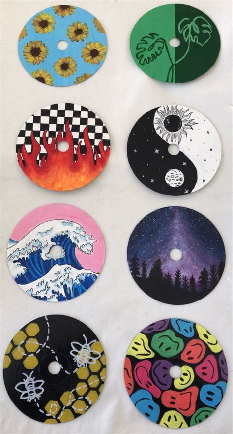 painted CDs | Book art diy, Painted records, Vinyl record art ideas