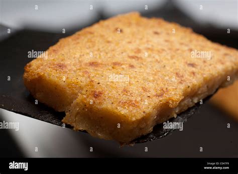 fried cornmeal mush Stock Photo - Alamy