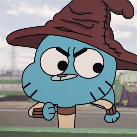 an animated character wearing a witches hat and holding a stick in front of a street