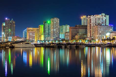 Manila City Skyline At Night by Stuart Dee