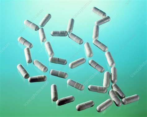 Calcium pills - Stock Image - M627/0133 - Science Photo Library