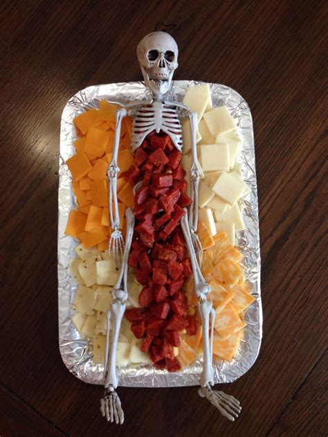 Skeleton Meat & Cheese Platter | Spooky halloween party, Halloween party kids, Halloween food ...