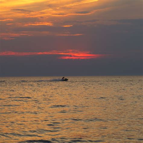 Jet skier at sunset | Smithsonian Photo Contest | Smithsonian Magazine