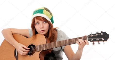 Teenager girl playing an acoustic guitar — Stock Photo © spaxiax #4177341