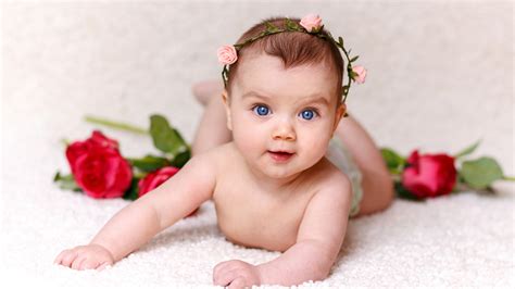 Blue Eyes Cute Little Girl Child Baby Is Lying Down On White Fur Cloth ...