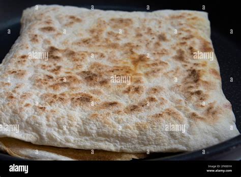 traditional turkish cuisine: flatbread. With Cheese or vegetables Stock Photo - Alamy