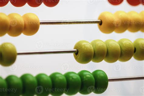 Abacus with wooden colored beads 22259309 Stock Photo at Vecteezy