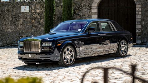 Black Rolls Royce Phantom parked on concrete pavement during daytime HD wallpaper | Wallpaper Flare