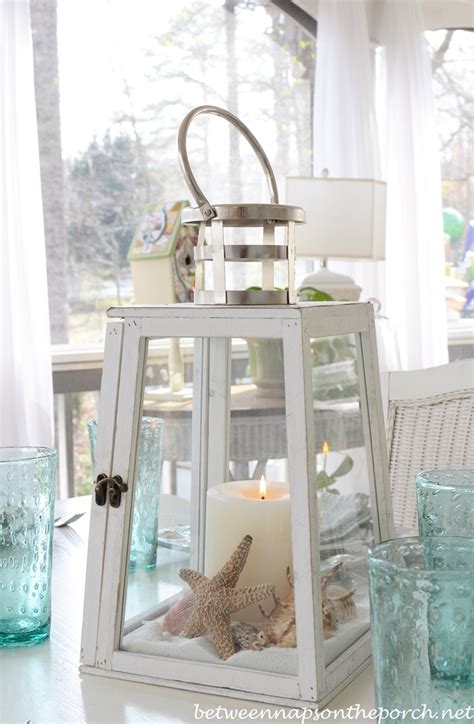 Beach Themed Table Setting Tablescape With Lighthouse Lantern and Shell, Sailboat Dishware