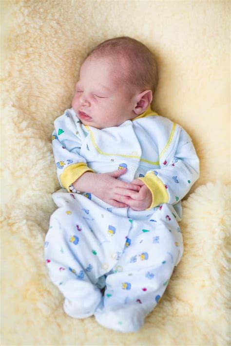 Newborn Baby Boy Sleeping on a Sheepskin Stock Photo - Image of sleeping, girl: 41507126