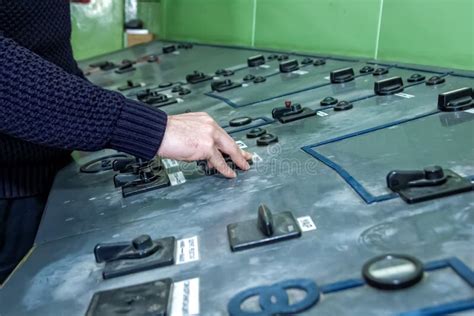 Electrician Working in the Power Station on the Control Panel of Steam Turbines Stock Photo ...