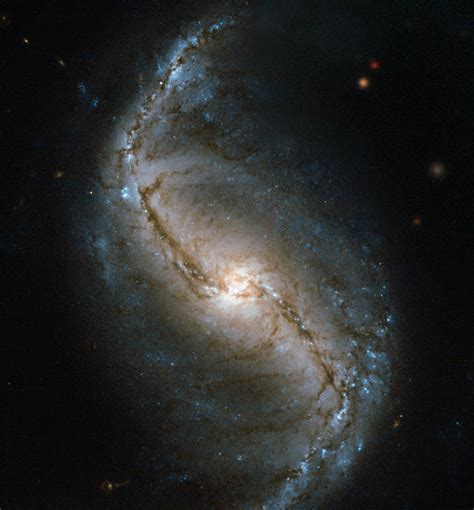 A Spiral in a Furnace - Barred Spiral Galaxy NGC 986