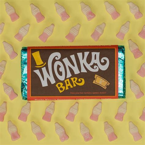 a bar of wonka's candy on a yellow and pink background with small candies