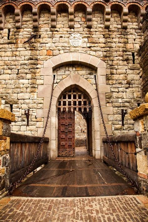 Drawbridge to Castle Door. A wooden drawbridge with chains leads to wooden doors , #AD, #wooden ...