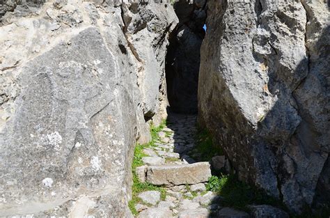 Entrance to Chamber B with a relief of a winged, lion-head… | Flickr