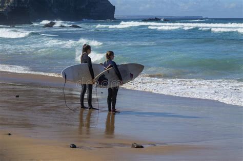 Young Girls at a Sandy Beach Editorial Stock Image - Image of famous, destination: 254755064