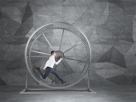 Businessman in Spinning Wheel Stock Photo - Image of male, mechanism ...