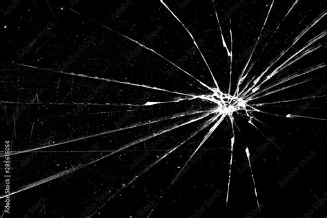 cracked glass isolated on a black background. broken glass Stock Photo ...