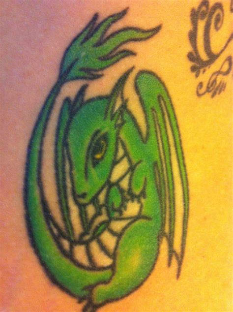 Baby Dragon tattoo | Dragon tattoo, Baby dragon tattoo, Tattoos