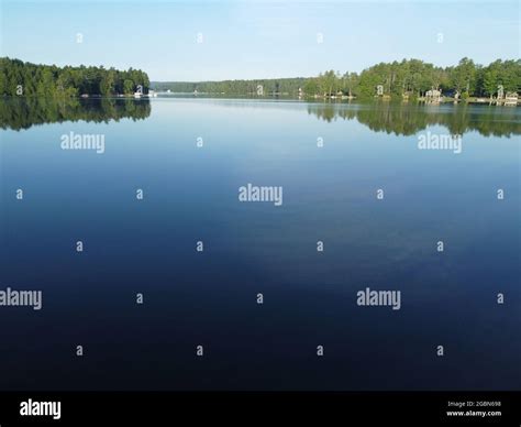 Calm Lake Water Reflection Stock Photo - Alamy