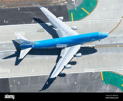 Aerial view of Royal Dutch Airlines Boeing 747 departure from LAX airport. KLM B747 aircraft ...