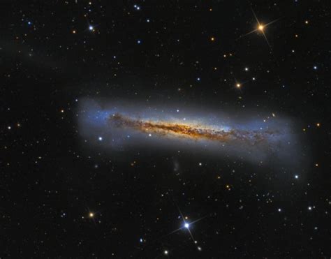 Galaxy NGC 3628, an edge-on view. Nicknamed The Hamburger Galaxy, located in the sky in the ...