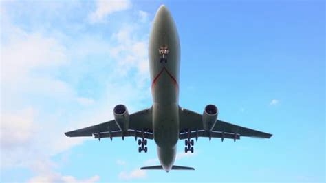 Slow Motion Close Commercial Airplane Flying Stock Footage Video (100% Royalty-free) 32740774 ...