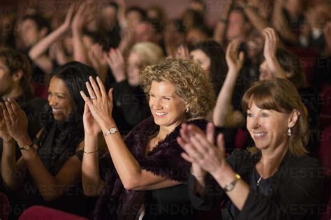 Clapping theater audience stock photo