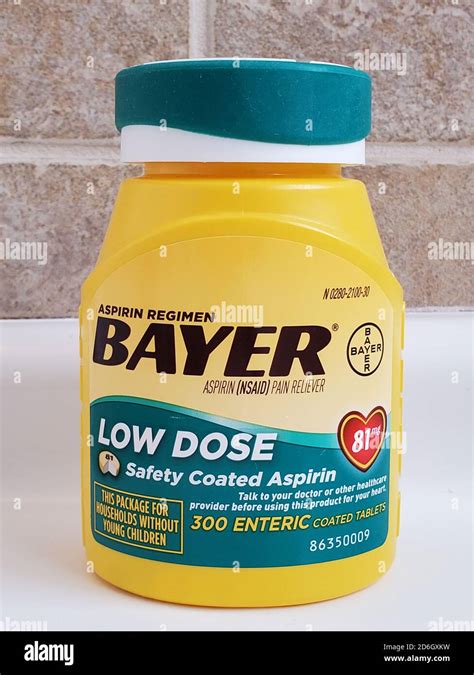 Close-up of Bayer brand low-dose aspirin or baby aspirin in bathroom setting, San Ramon ...